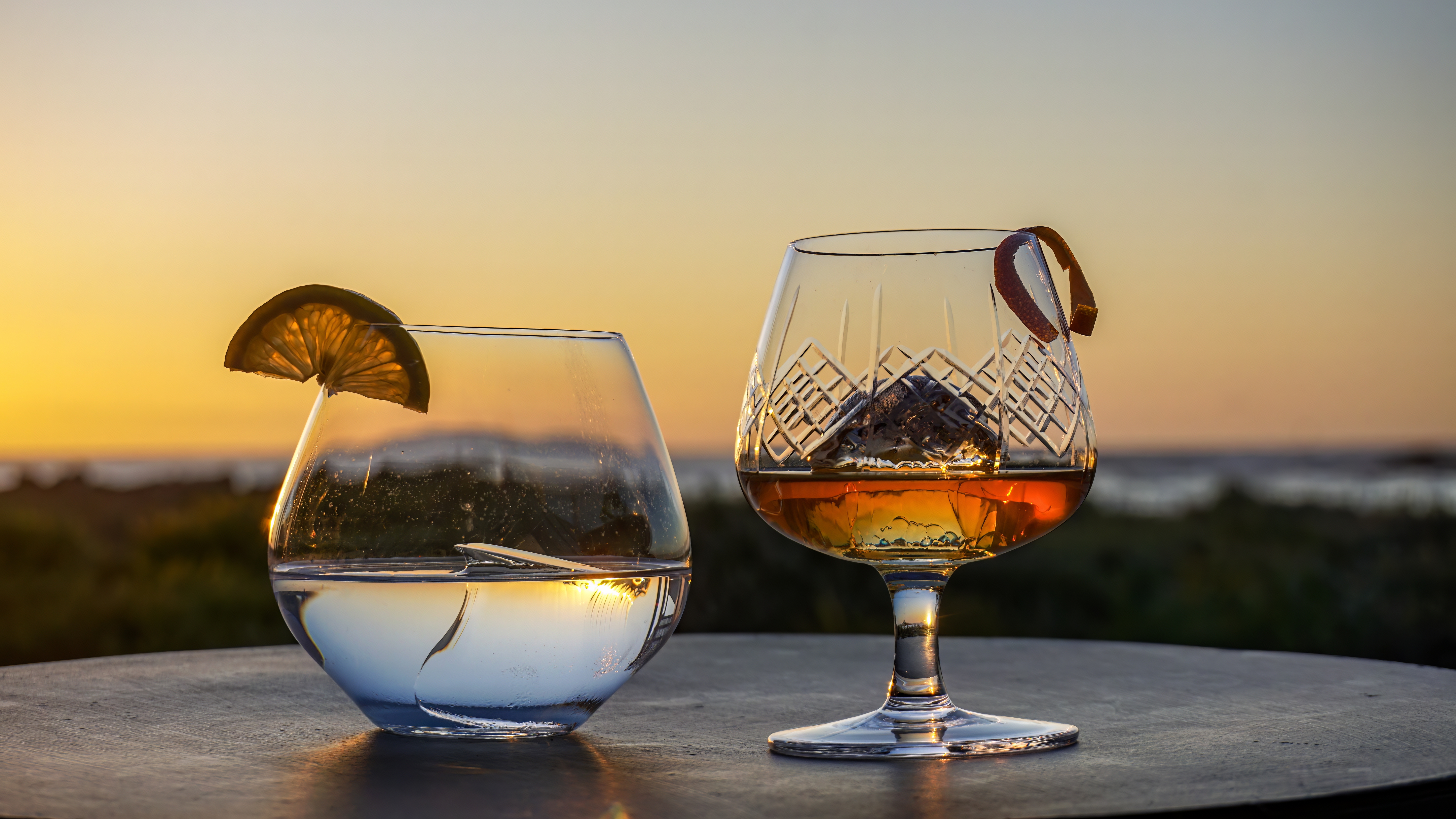 Crystal-clear ice in premium cocktail at upscale bar setting